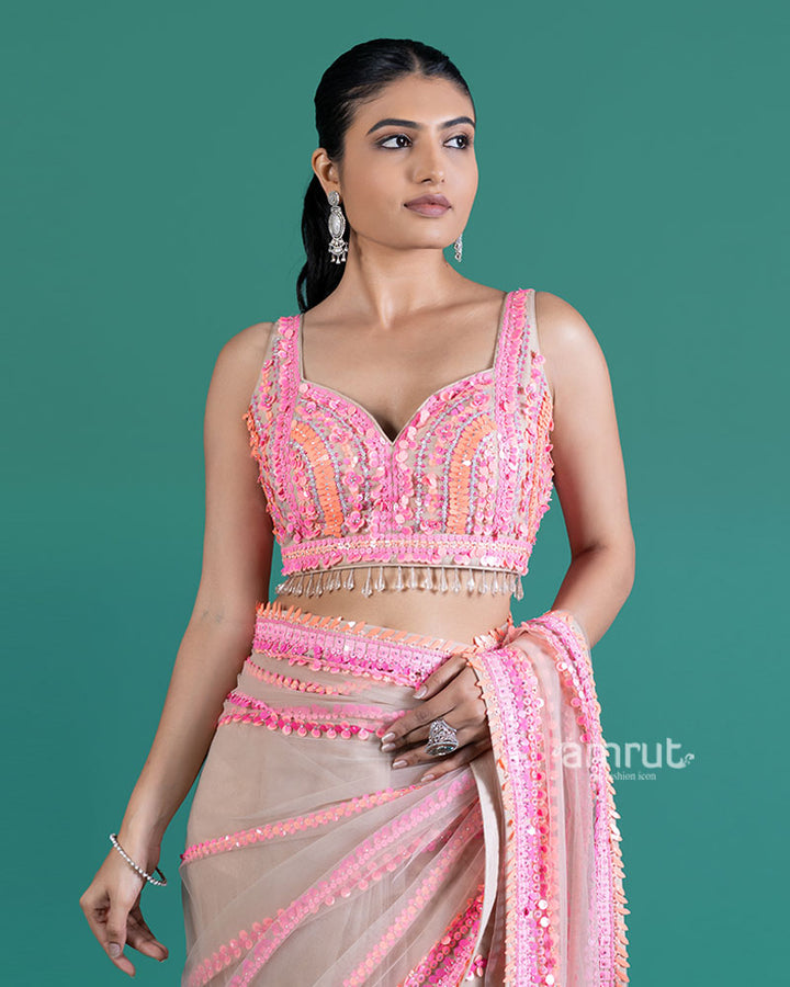 Cream with Pink Sequin Embellished Net Saree and Sleeveless Embellished Blouse