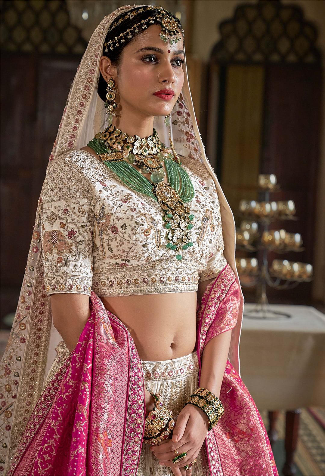 Ivory & Rose Handcrafted Bridal Lehenga with Zardozi and Elephant Motifs