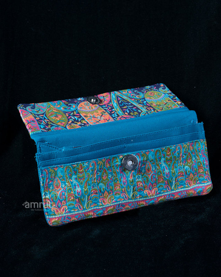 Teal Brocade Clutch with Vibrant Floral and Paisley Motifs Print