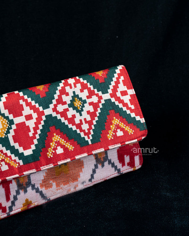 Red and Green Geometric Fold-Over Clutch with Floral Lining