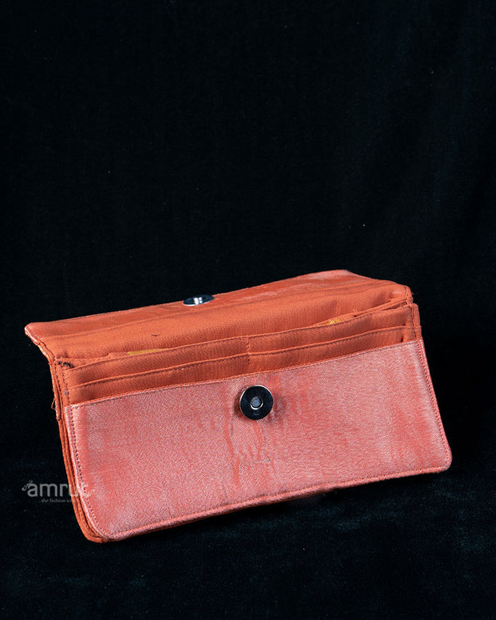 Coral Gold Embossed Floral Clutch