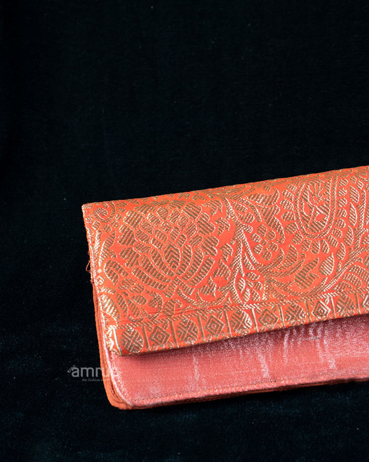Coral Gold Embossed Floral Clutch