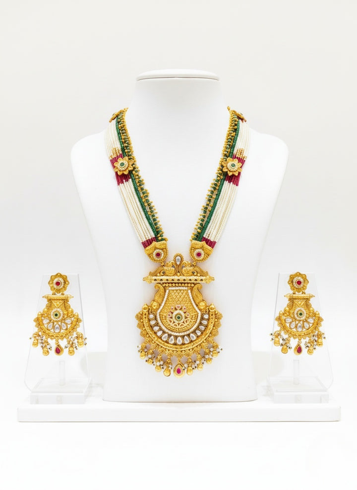 Antique Gold Lakshmi Temple Necklace Set with Kundan and Pearl Detailing