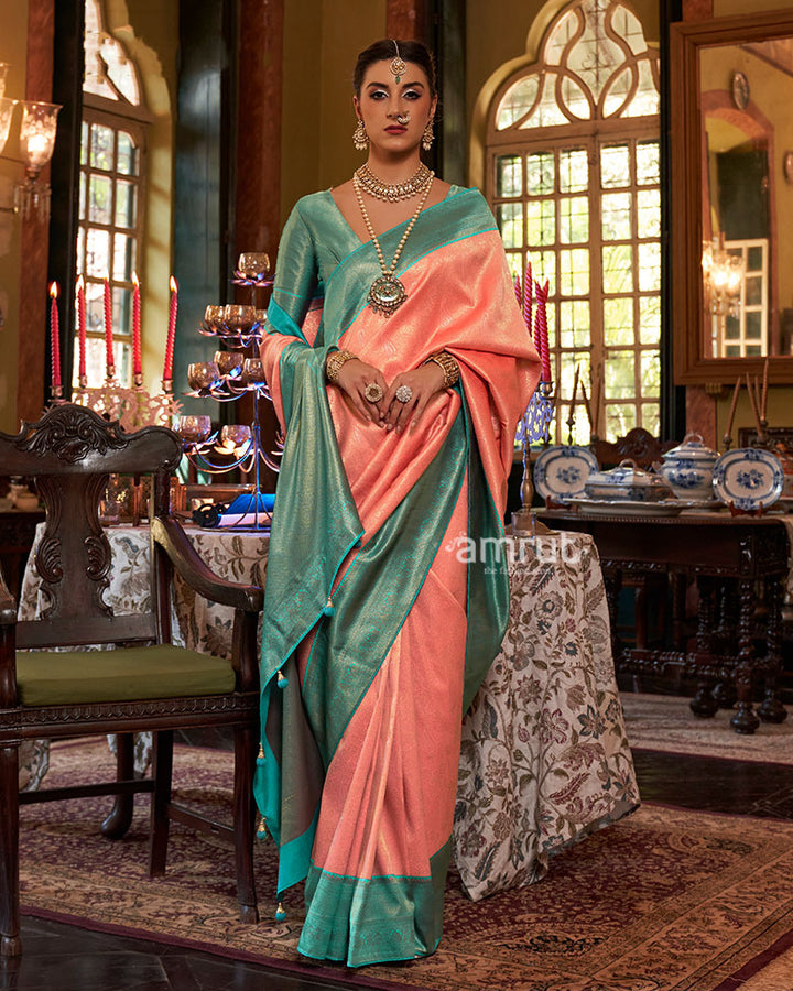 Orange and Turquoise Paisley Woven Border Kanjeevaram Silk Saree with Unstitched Blouse 01
