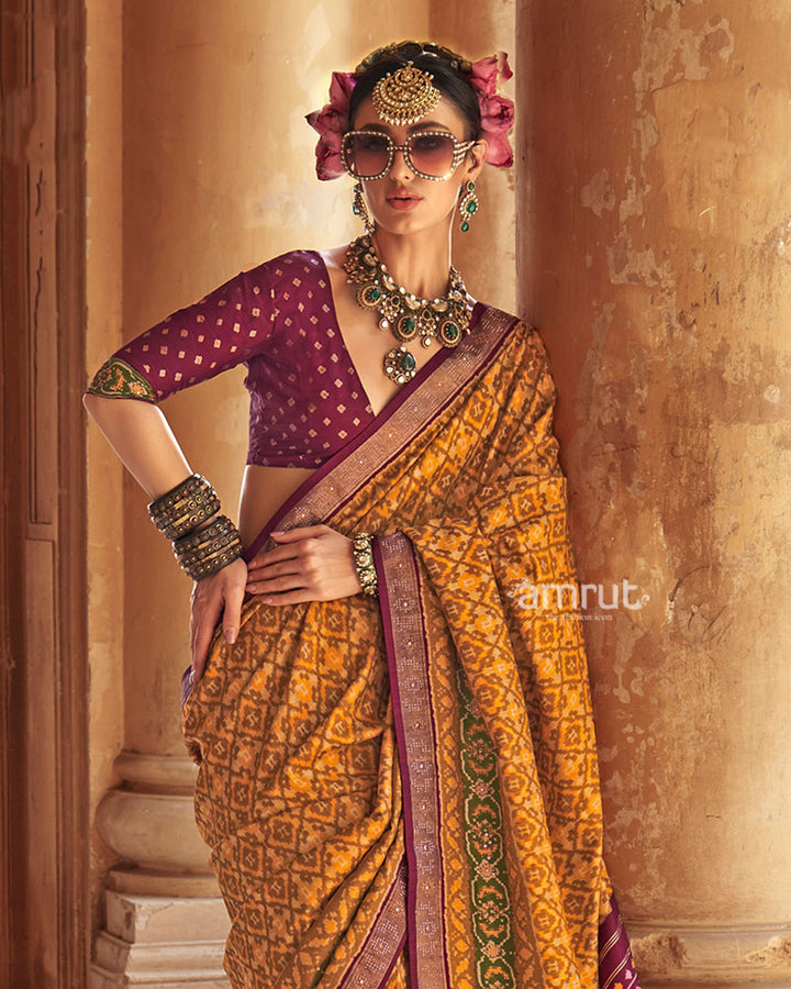Yellow Patola Silk Saree with Purple Embellished Border and Unstitched Blouse 02