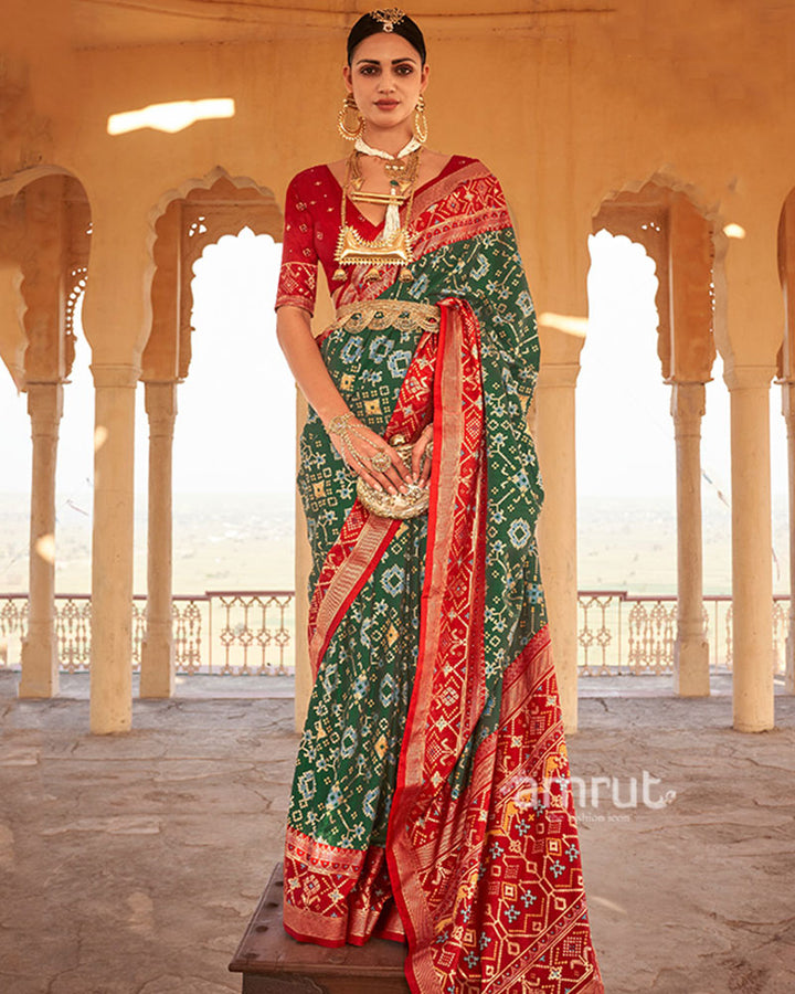 Green Ikat Printed and Red Contrast Border Patola Silk Saree with Unstitched Blouse