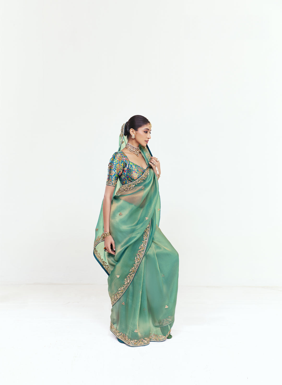 Sea Green Georgette Saree with Heavy Embroidered Border