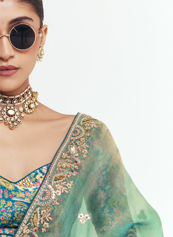 Sea Green Georgette Saree with Heavy Embroidered Border
