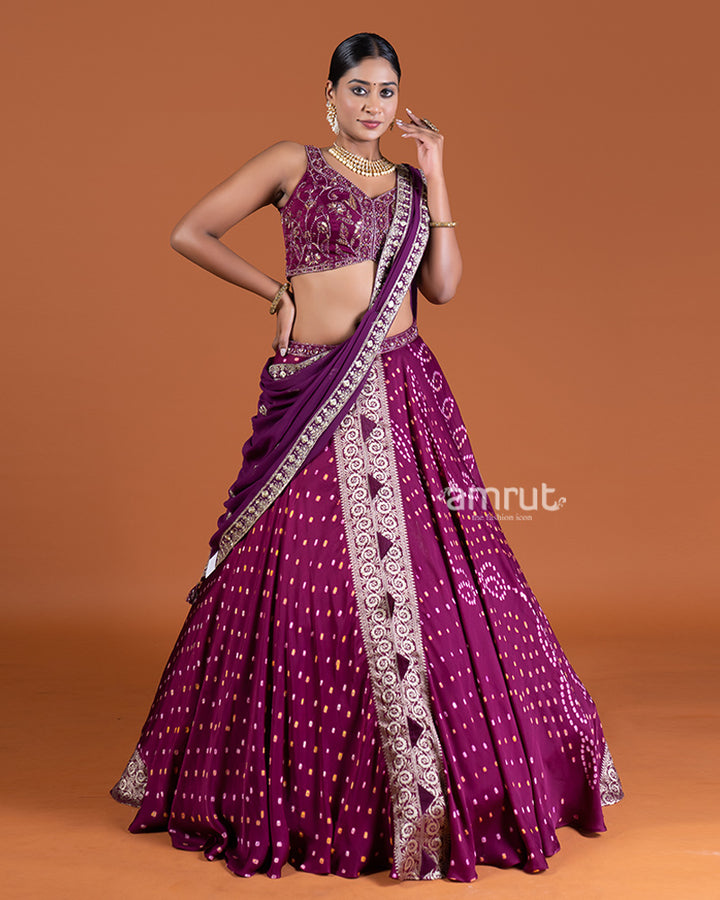 Purple Bandhani Lehenga with Embroidered Choli and Draped Dupatta