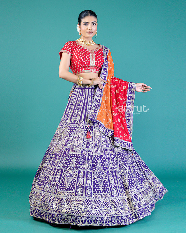 Vibrant Purple Lehenga Crimson Red Choli with Silver Embroidery and Red-Orange Dupatta