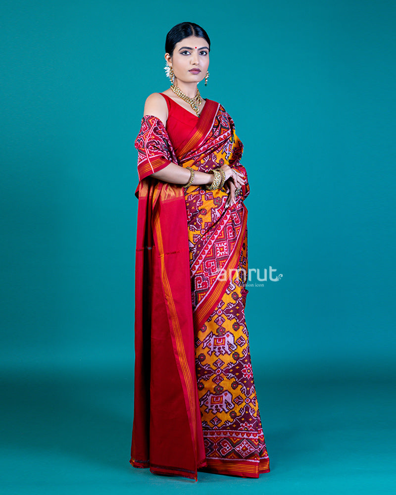 Mustard Yellow Patola Print Silk Saree with Red Contrast and Unstitched Blouse