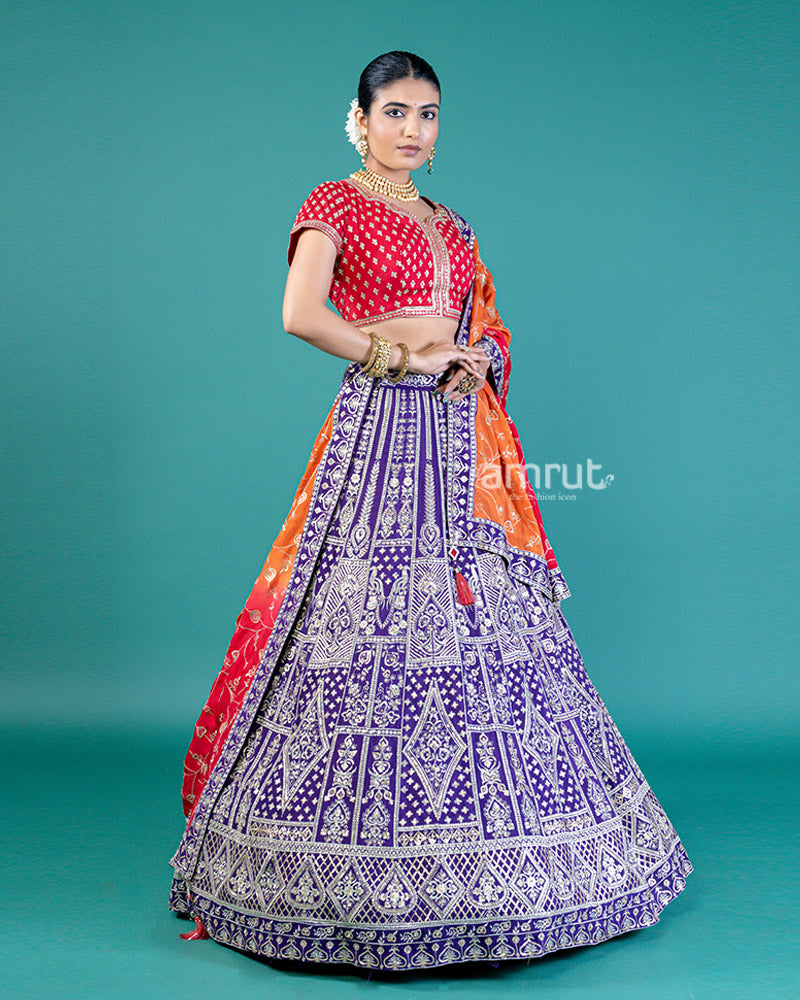 Vibrant Purple Lehenga Crimson Red Choli with Silver Embroidery and Red-Orange Dupatta