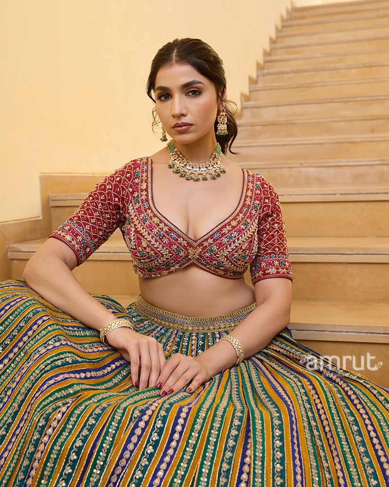 Multicolored Striped Lehenga with Embroidered Choli and Red Dupatta