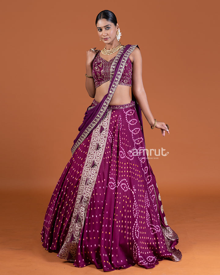 Purple Bandhani Lehenga with Embroidered Choli and Draped Dupatta