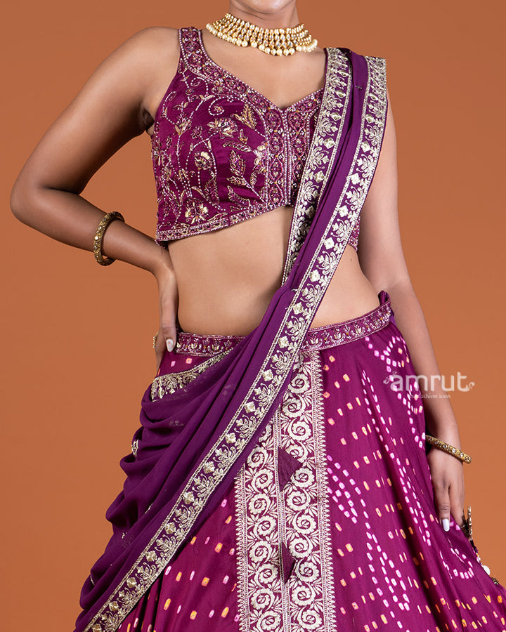 Purple Bandhani Lehenga with Embroidered Choli and Draped Dupatta