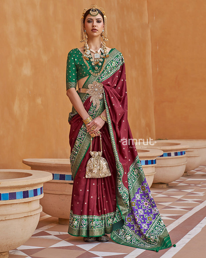 Maroon Zari Weaving Green Border Saree in Patola Silk with Unstitched Blouse