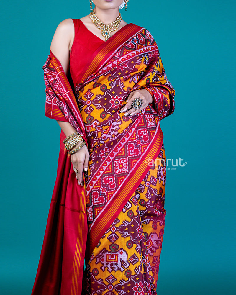 Mustard Yellow Patola Print Silk Saree with Red Contrast and Unstitched Blouse