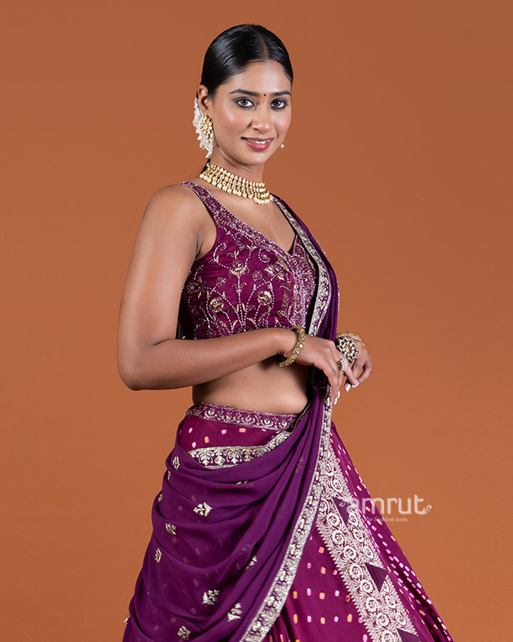 Purple Bandhani Lehenga with Embroidered Choli and Draped Dupatta