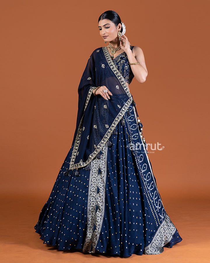 Blue Bandhani Lehenga with Embroidered Choli and Draped Dupatta