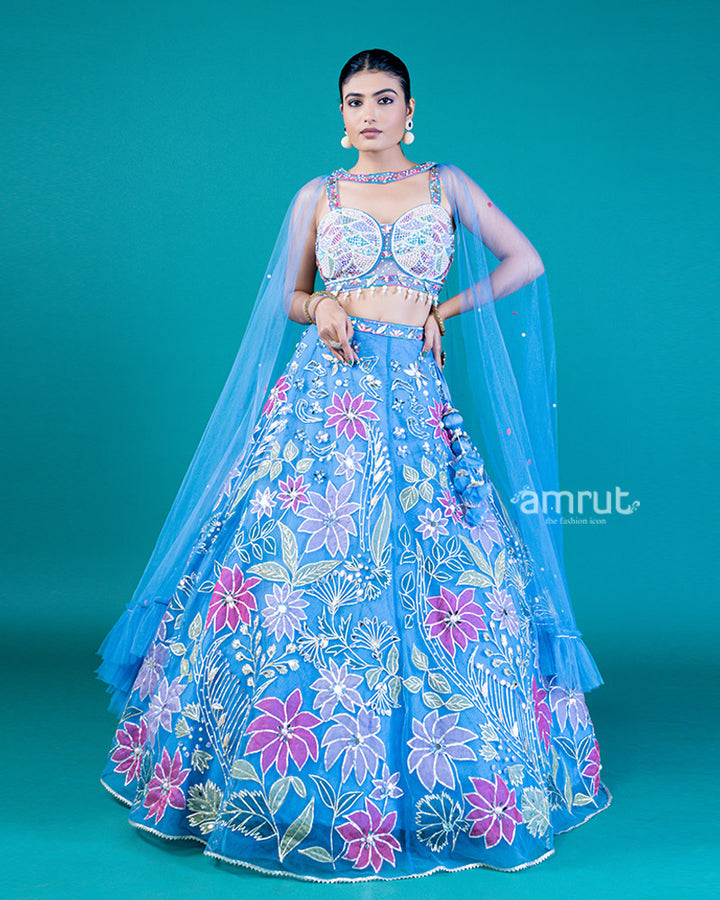 Embellished Blue Koi Lehenga Choli with Floral Embroidery and Attached Dupatta