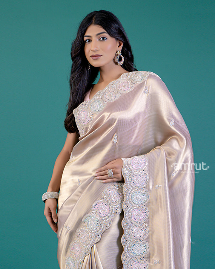 Beige Silk Saree with Intricate Border Detailing and Unstitched Blouse