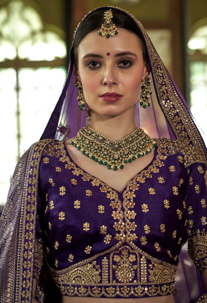 Royal Purple Bridal Lehenga with Double Dupatta & Exquisite Golden Zardozi Work