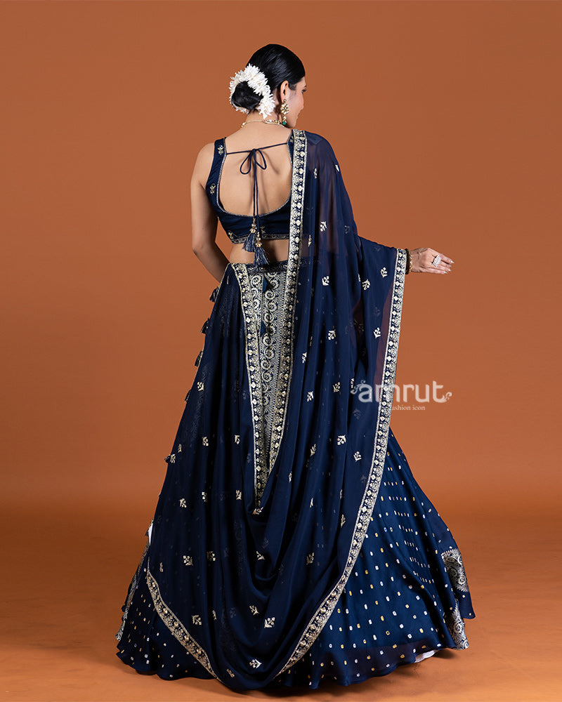 Blue Bandhani Lehenga with Embroidered Choli and Draped Dupatta