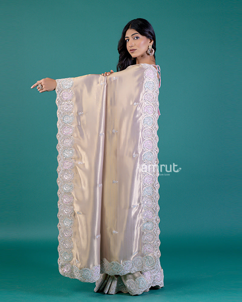 Beige Silk Saree with Intricate Border Detailing and Unstitched Blouse