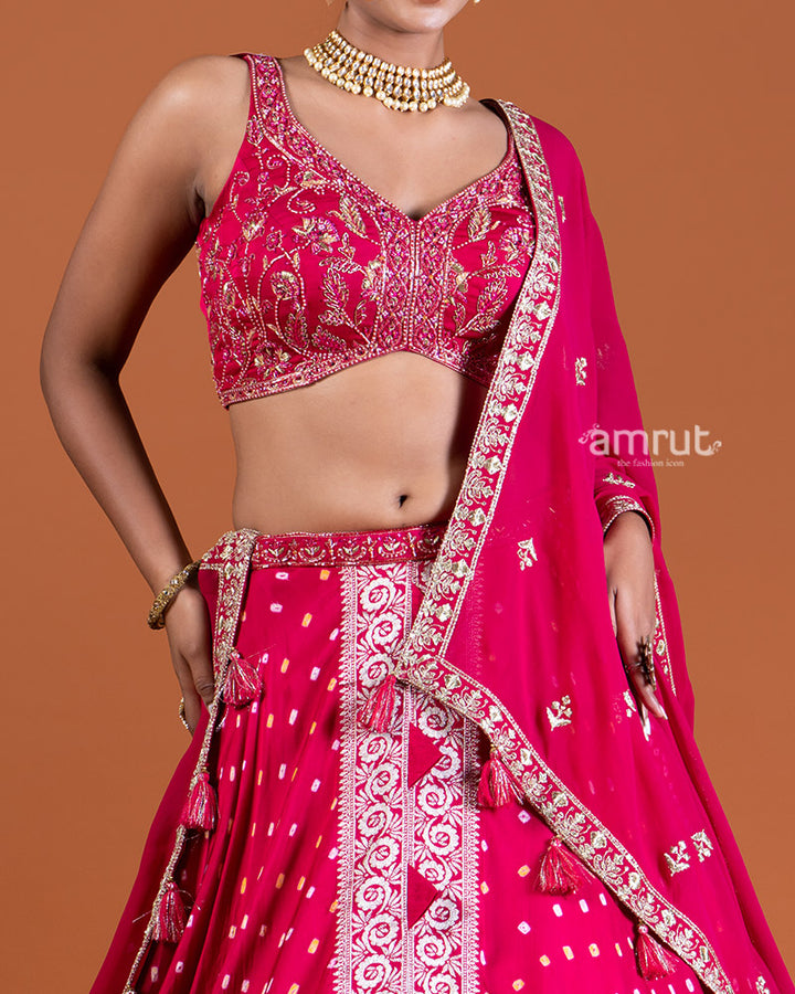 Magenta Pink Bandhani Lehenga with Embroidered Choli and Draped Dupatta