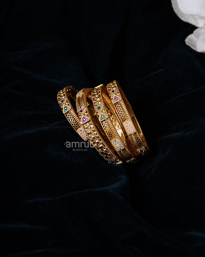 Gold Toned Bangle Set with Ruby, Emerald, and Opalescent Inlays