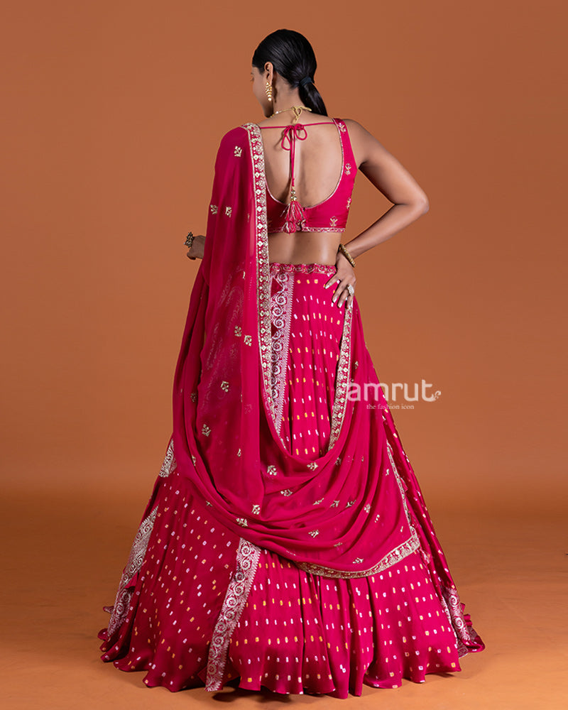 Magenta Pink Bandhani Lehenga with Embroidered Choli and Draped Dupatta