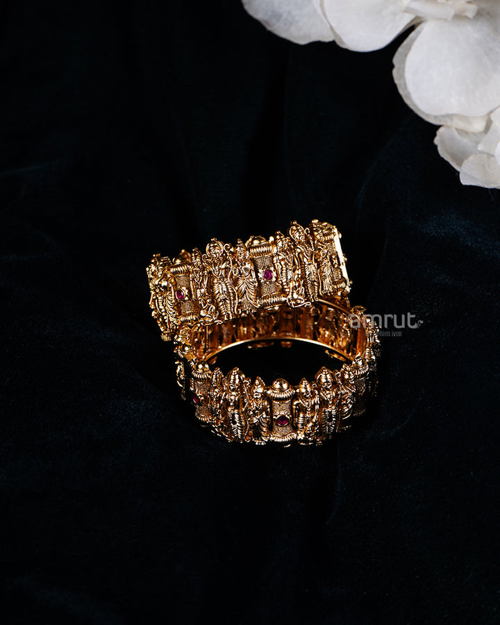 Bhagwan Ram Carving and Red Gemstone Accents Gold Toned Bangles