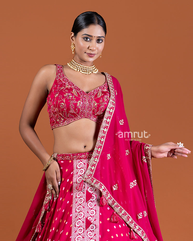 Magenta Pink Bandhani Lehenga with Embroidered Choli and Draped Dupatta