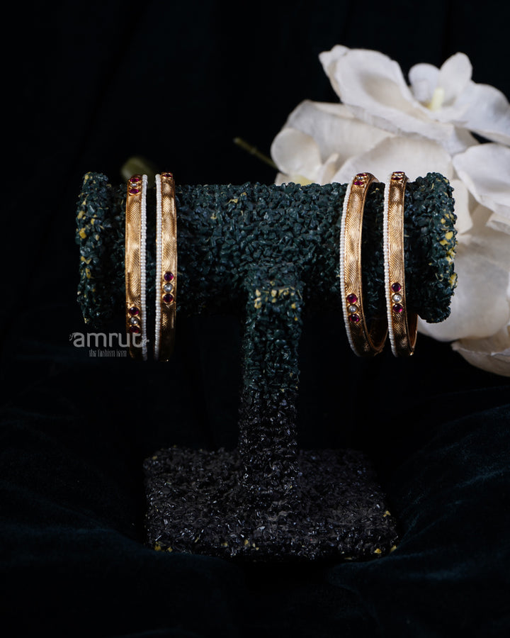 Ruby and Bead Embellished Intricate Design Gold-Toned Bangles