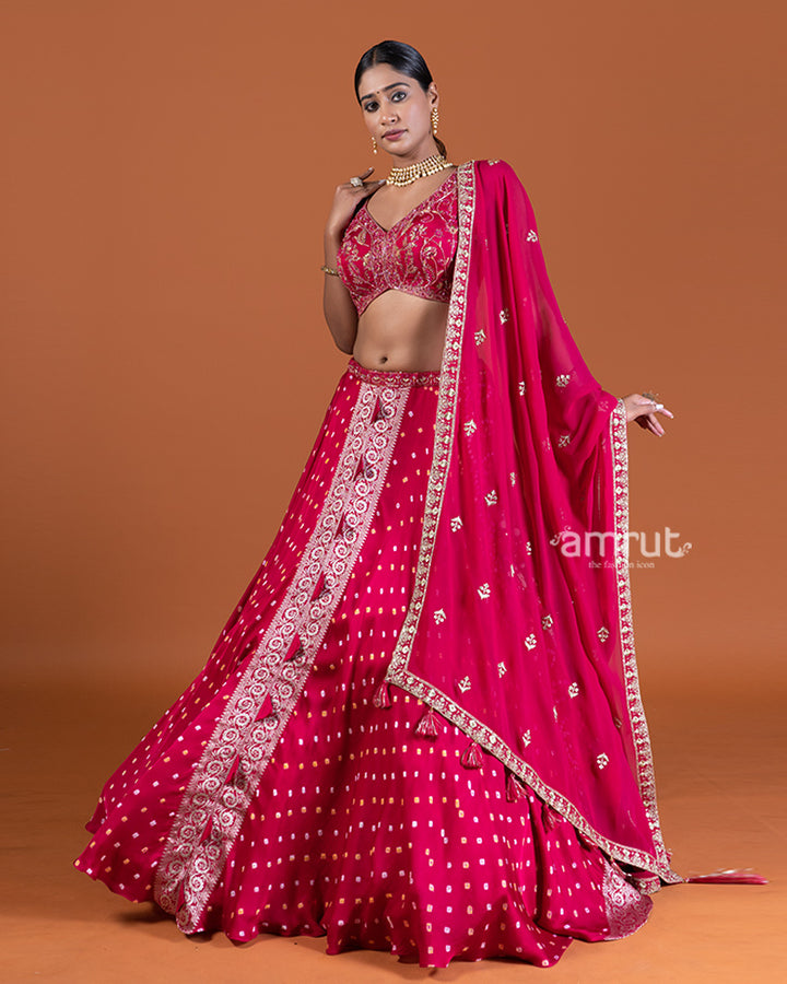 Magenta Pink Bandhani Lehenga with Embroidered Choli and Draped Dupatta