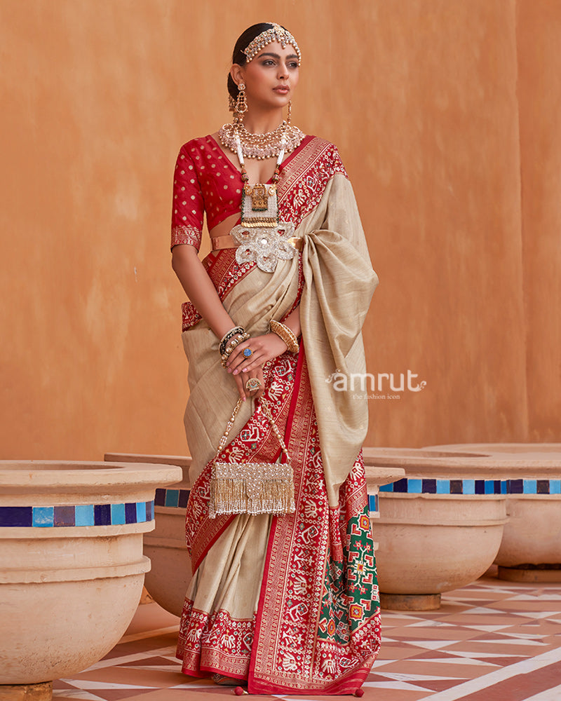 Cream Zari Weaving Red Border Saree in Patola Silk with Unstitched Blouse