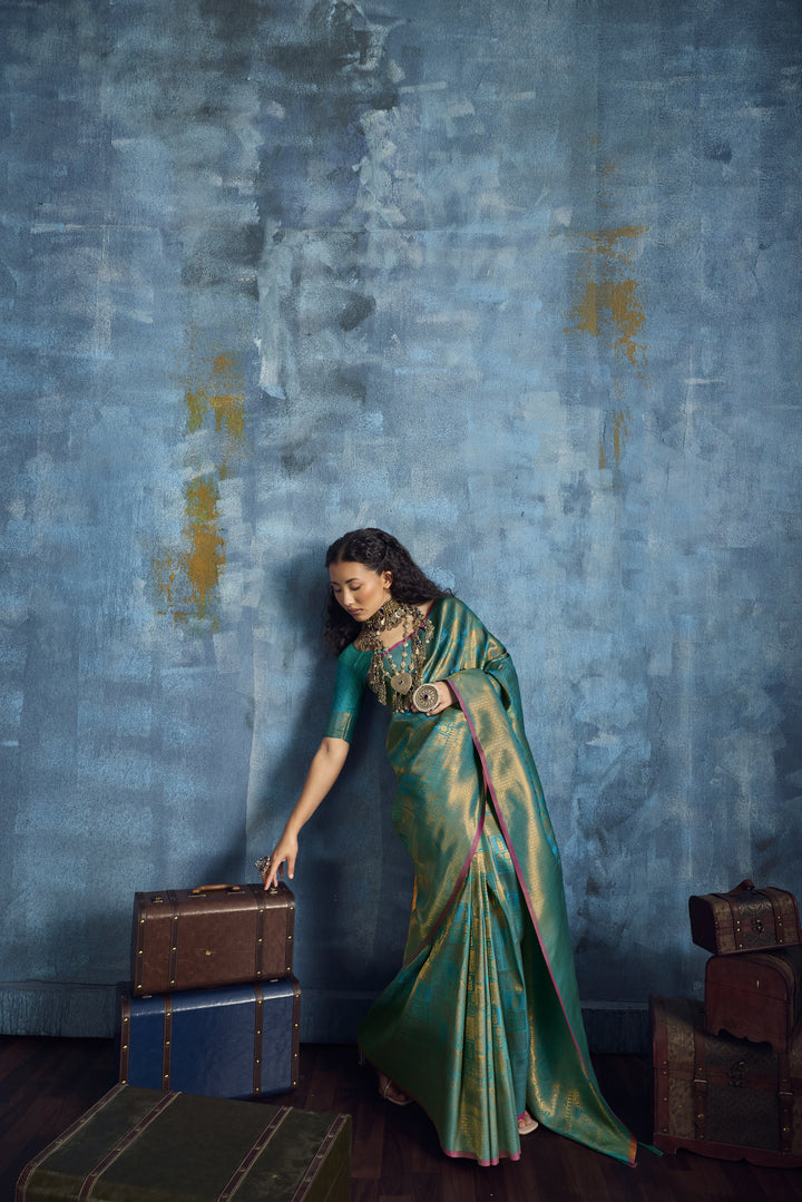 Teal Green Handloom Silk Saree with Gold Zari Weaving & Contrast Border