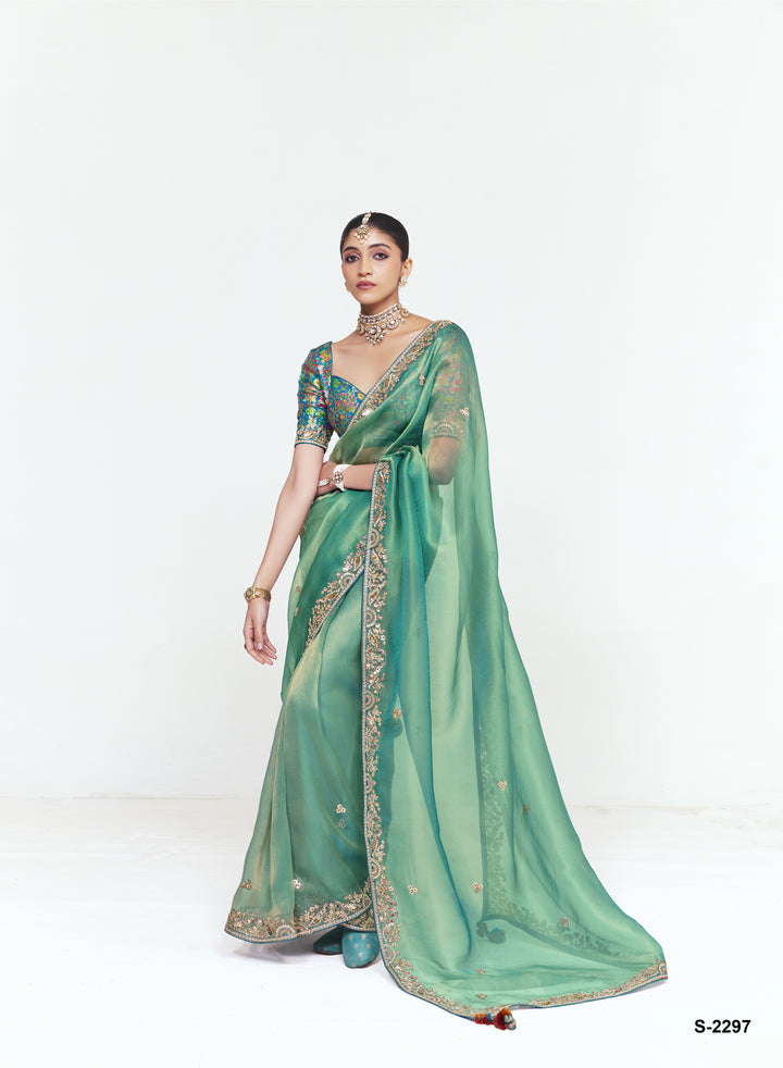 Sea Green Georgette Saree with Heavy Embroidered Border