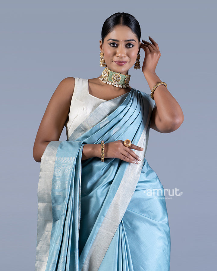 Light Blue with Golden Zari Leaf Patterns and Geometric Motifs Saree with unstitched blouse