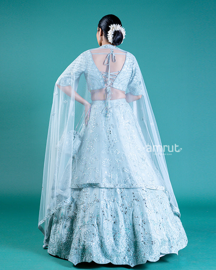 Aqua Blue Embellished Lehenga Choli with A-Line Skirt and Sheer Dupatta with Potli Hand Bag