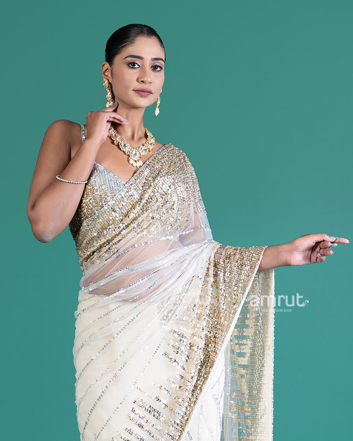Cream with Golden Silver Sequin Embellishments Net Saree and Embroidered Blouse