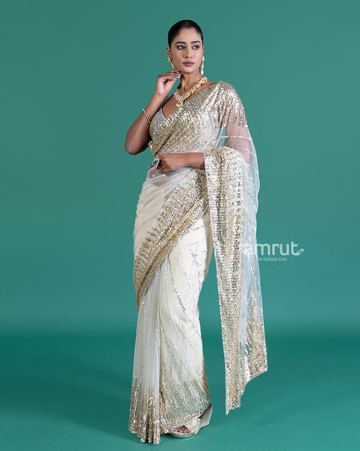 Cream with Golden Silver Sequin Embellishments Net Saree and Embroidered Blouse
