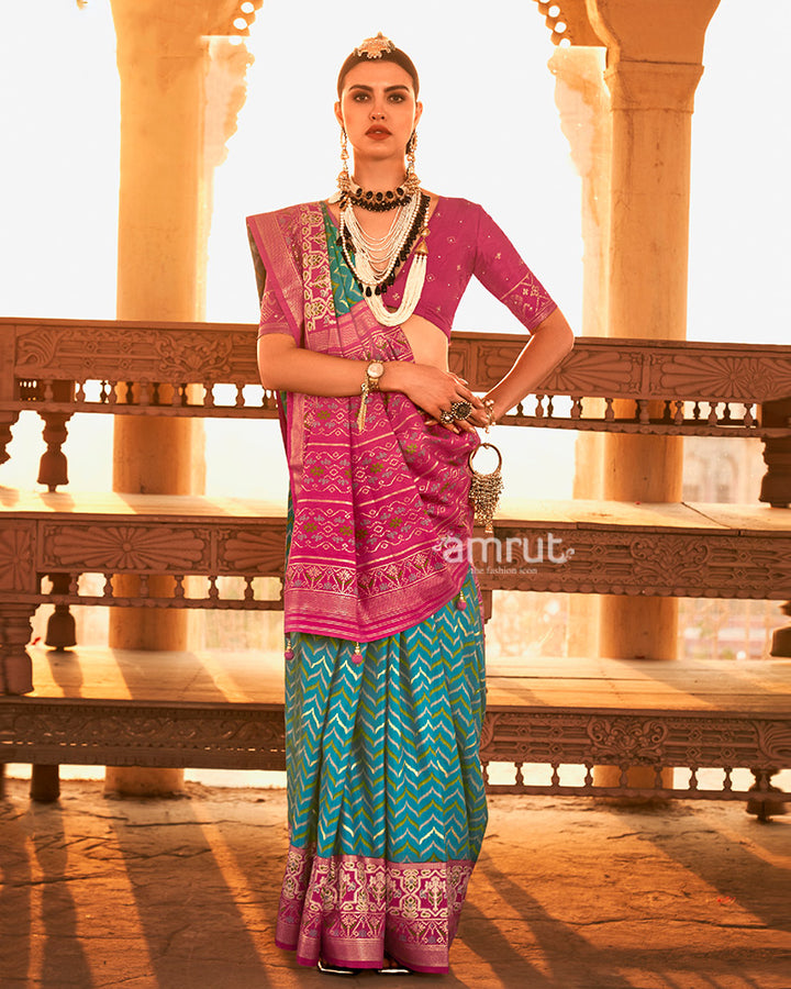 Teal Ikat Printed and Pink Contrast Border Patola Silk Saree with Unstitched Blouse