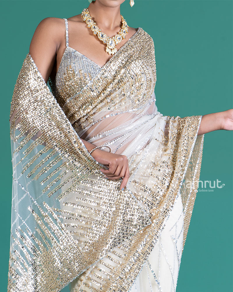 Cream with Golden Silver Sequin Embellishments Net Saree and Embroidered Blouse