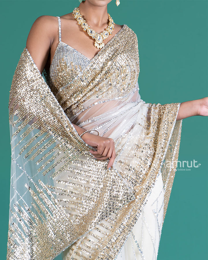 Cream with Golden Silver Sequin Embellishments Net Saree and Embroidered Blouse