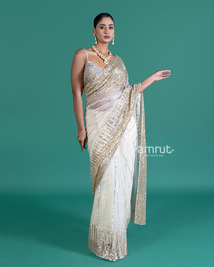 Cream with Golden Silver Sequin Embellishments Net Saree and Embroidered Blouse