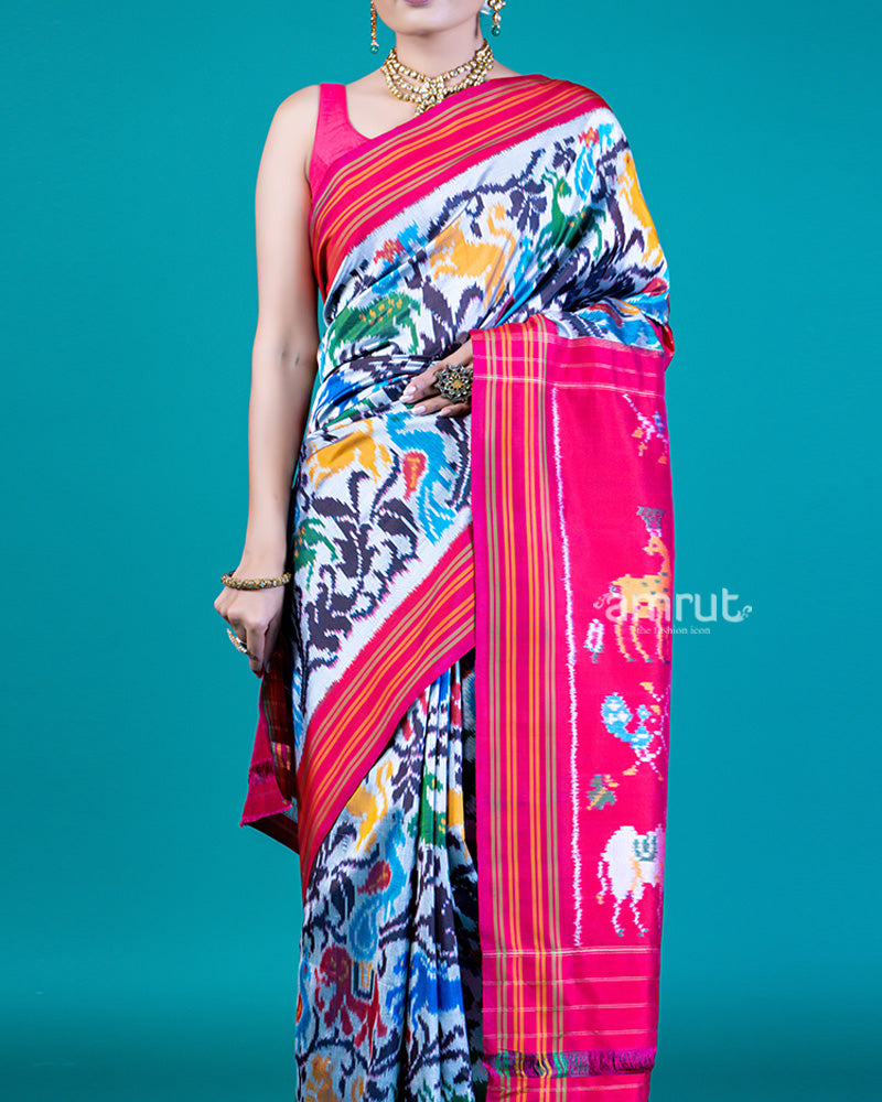 White Ethnic Patola Silk Saree with Multi-Color Motif Weaving and Unstitched Blouse