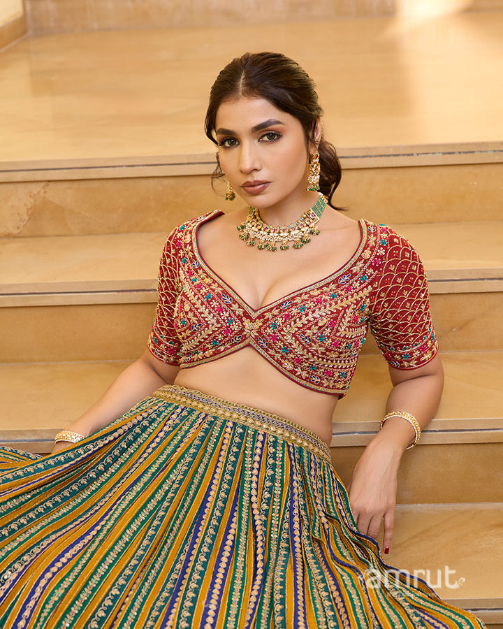 Multicolored Striped Lehenga with Embroidered Choli and Red Dupatta