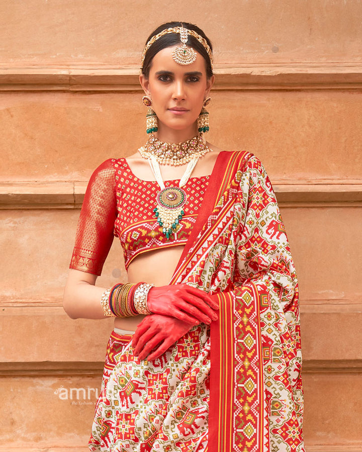 Ivory Patola Printed Saree with Red Zari Border and Unstitched Blouse