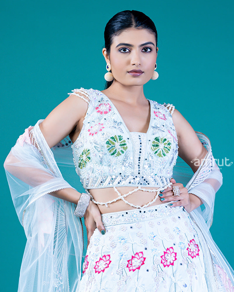 Embroidered White Lehenga with Lotus Design, Sweetheart Neckline Choli, and Sheer Dupatta